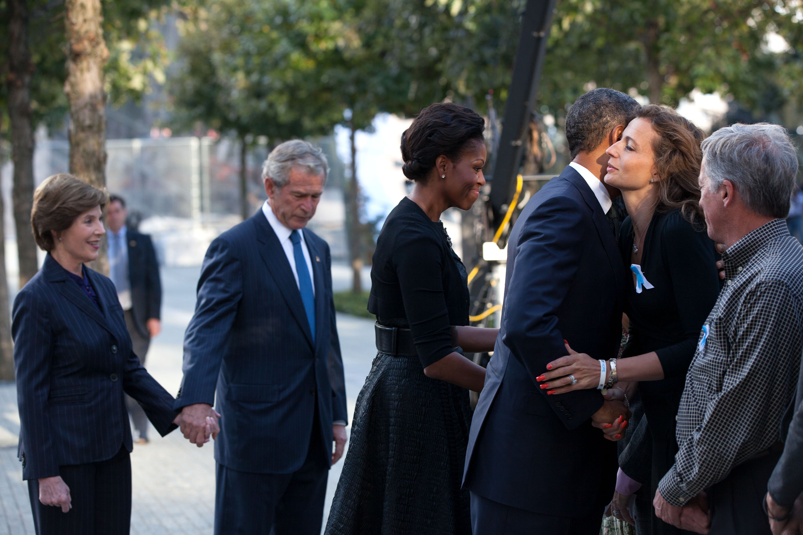 New York, Sept. 11, 2011. Greeting families, with former President and Mrs. Bush, prior to a commemoration ceremony on the tenth anniversary of the 9/11 terrorist attacksPresident and Mrs. Obama. (Official White House Photo by Pete Souza)