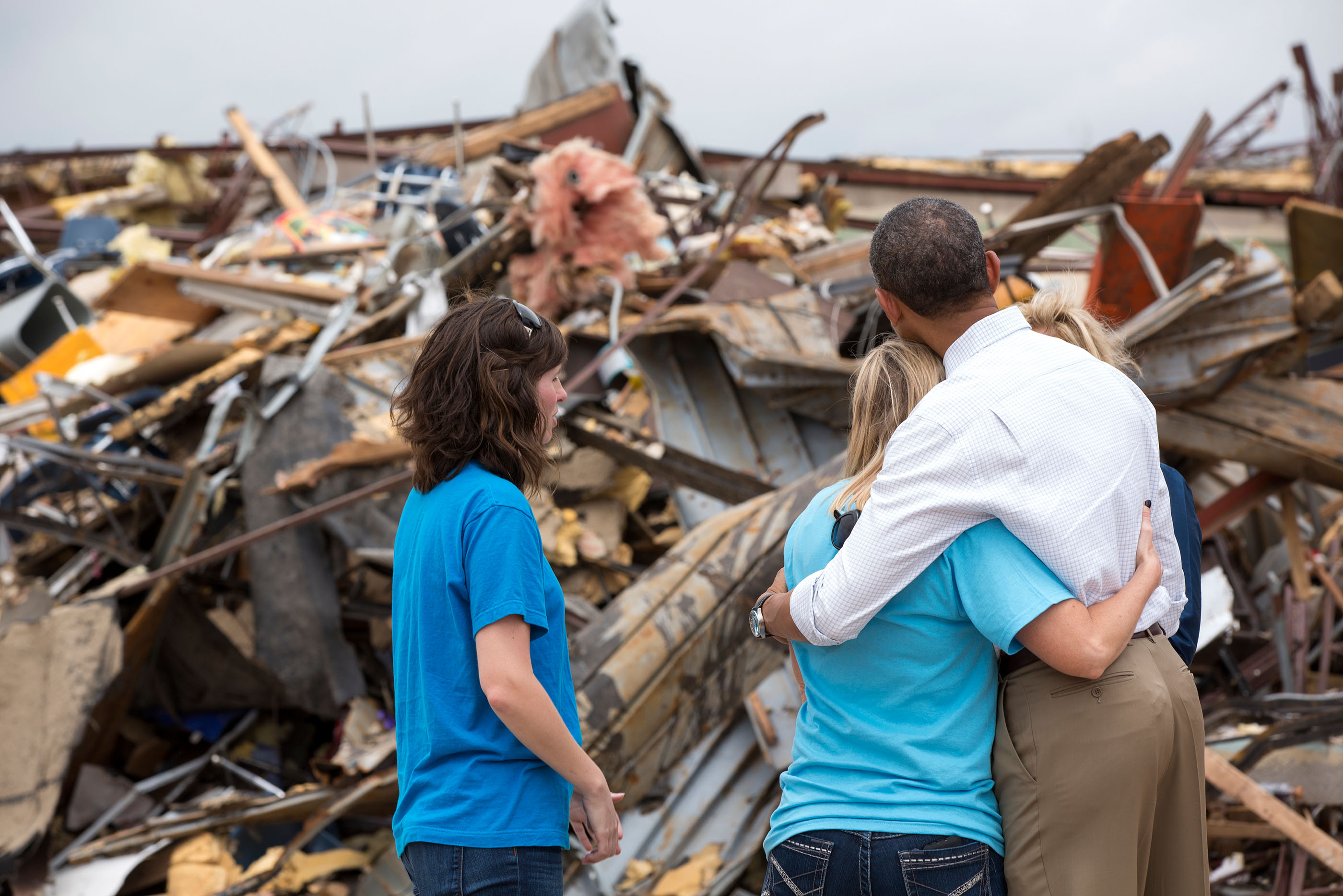 Oklahoma, May 26, 2013. Hugging Amy Simpson, principal of Plaza Towers Elementary School, while viewing the remains of the school following a devastating tornado in Moore. (Official White House Photo by Pete Souza)