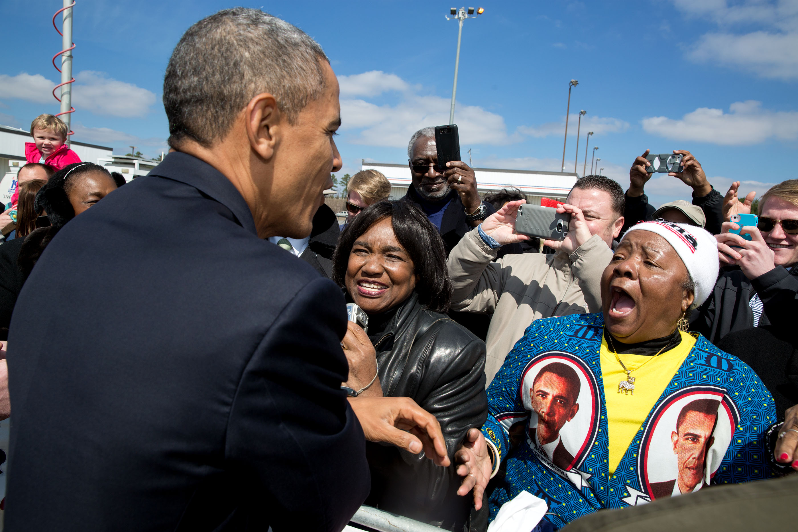 South Carolina, March 6, 2015. Reacting to an enthusiastic greeter at Columbia Metropolitan Airport. (Official White House Photo by Pete Souza)