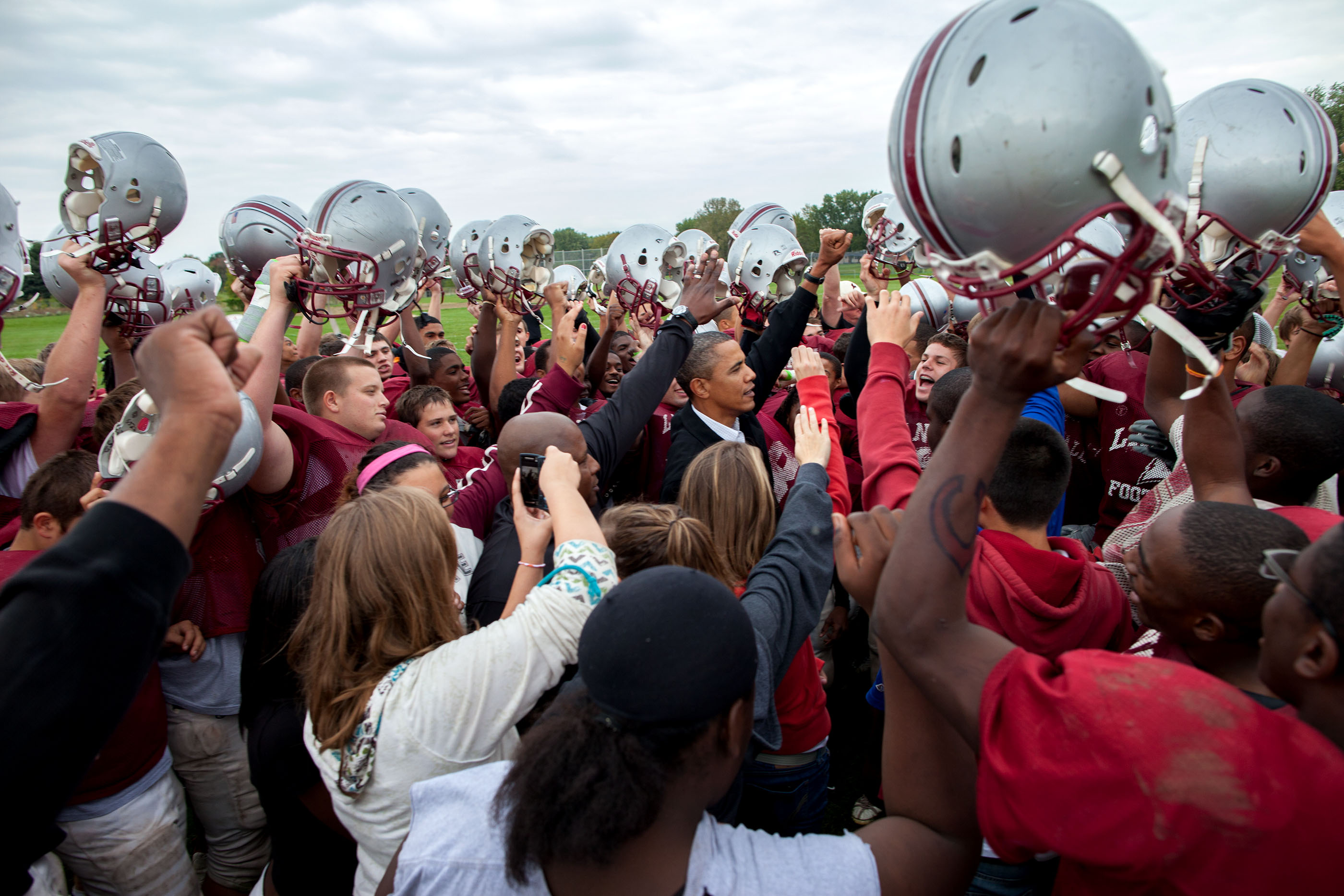 Wisconsin, Sept. 28, 2010. Cheering with the La Follette Lancers football team during their practice in Madison. (Official White House Photo by Pete Souza)