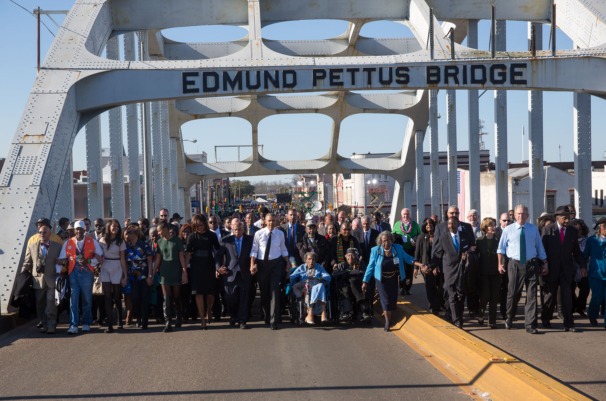 The Obamas and the Bushes continue across the bridge. (Official White House Photo by Lawrence Jackson)