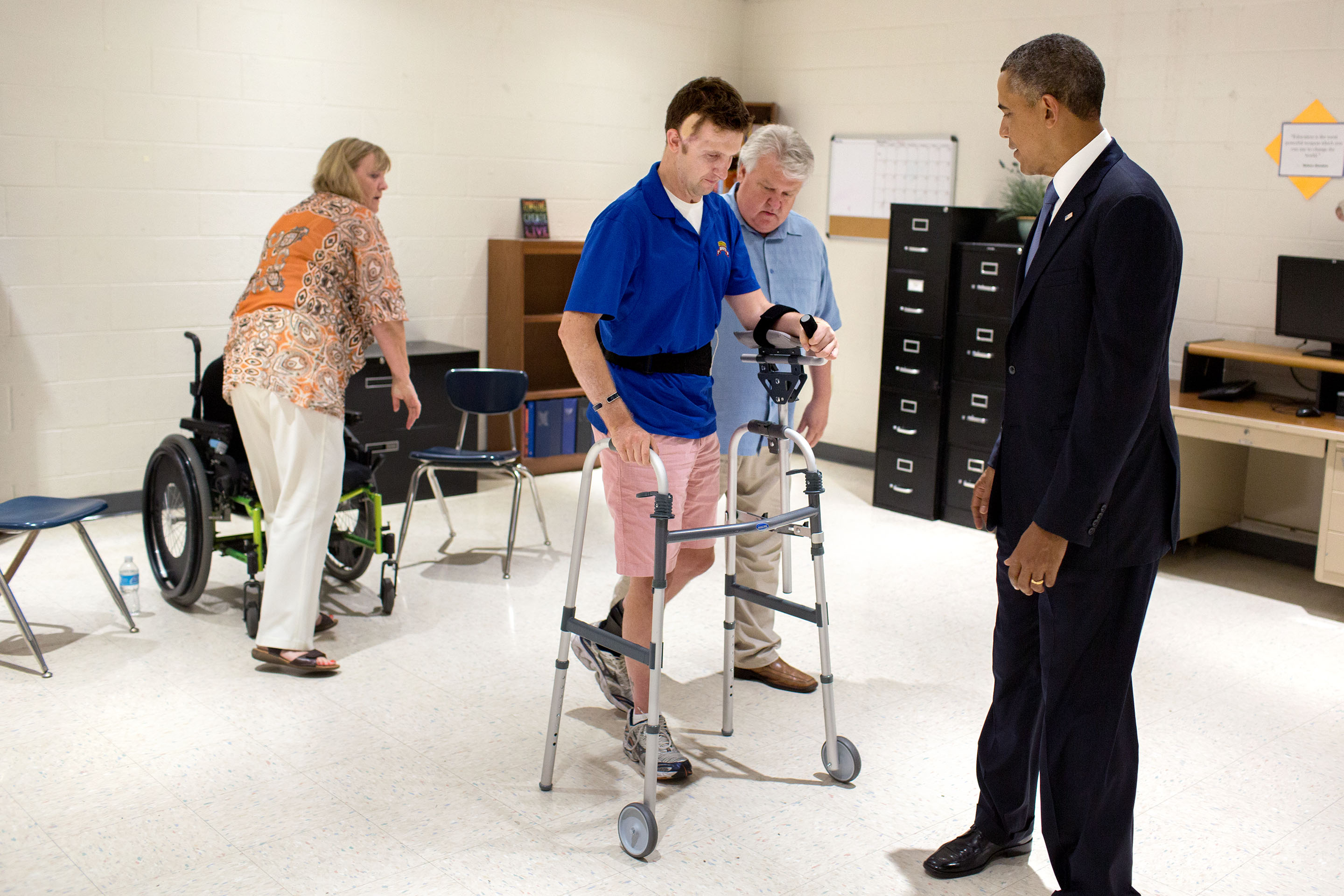Aug. 6, 2013: Cory walks across a classroom as the President watches in Arizona. (Official White House Photo by Pete Souza)
