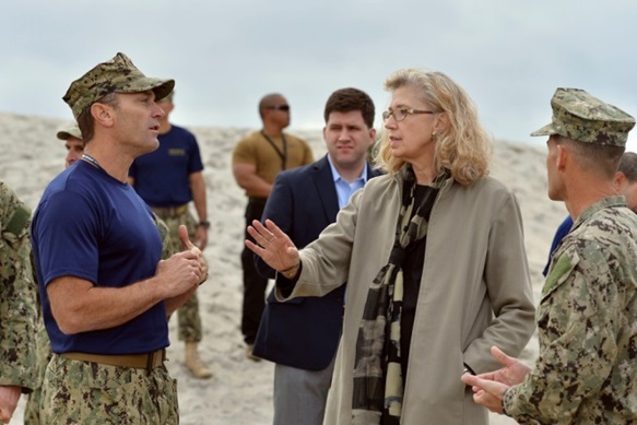 Acting Deputy Secretary of Defense Christine Fox is briefed by Master Chief Paul Baden (USN), as she tours SEAL Beach at the Navy Special Warfare Center in San Diego, Ca., Feb. 10, 2014.