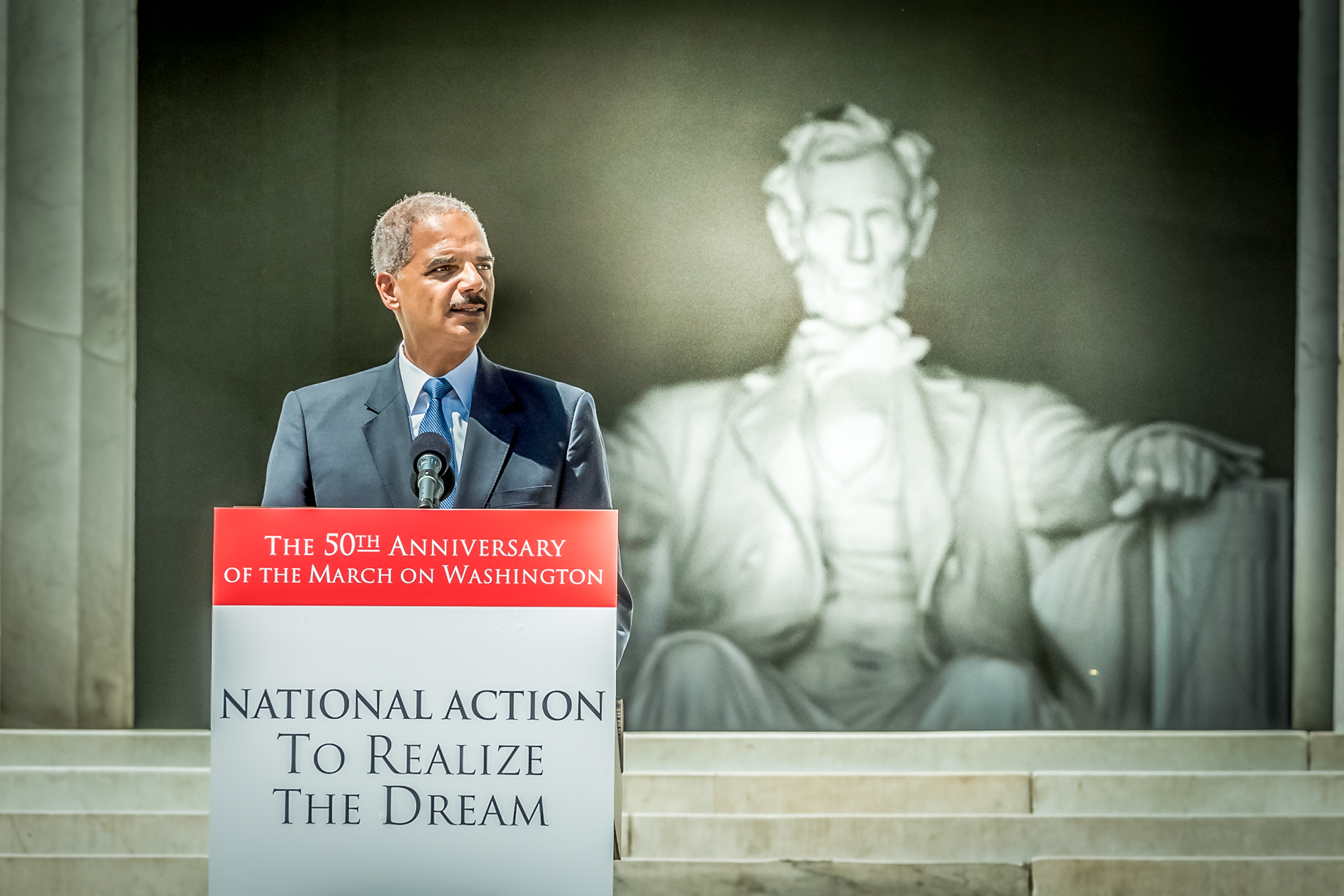 Attorney General Eric Holder speaks at the National Action to Realize the Dream March