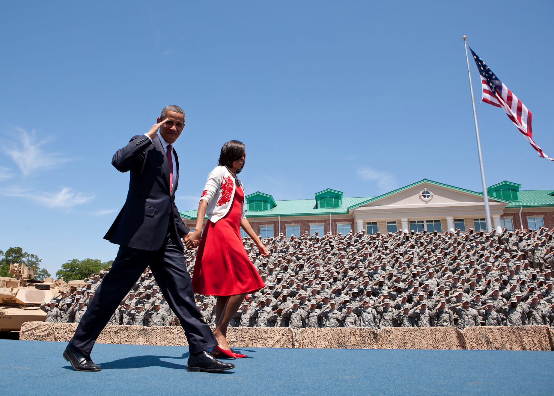 President Barack Obama and First Lady Michelle Obama walk on stage after being introduced at Fort Stewart (April 27, 2012) 