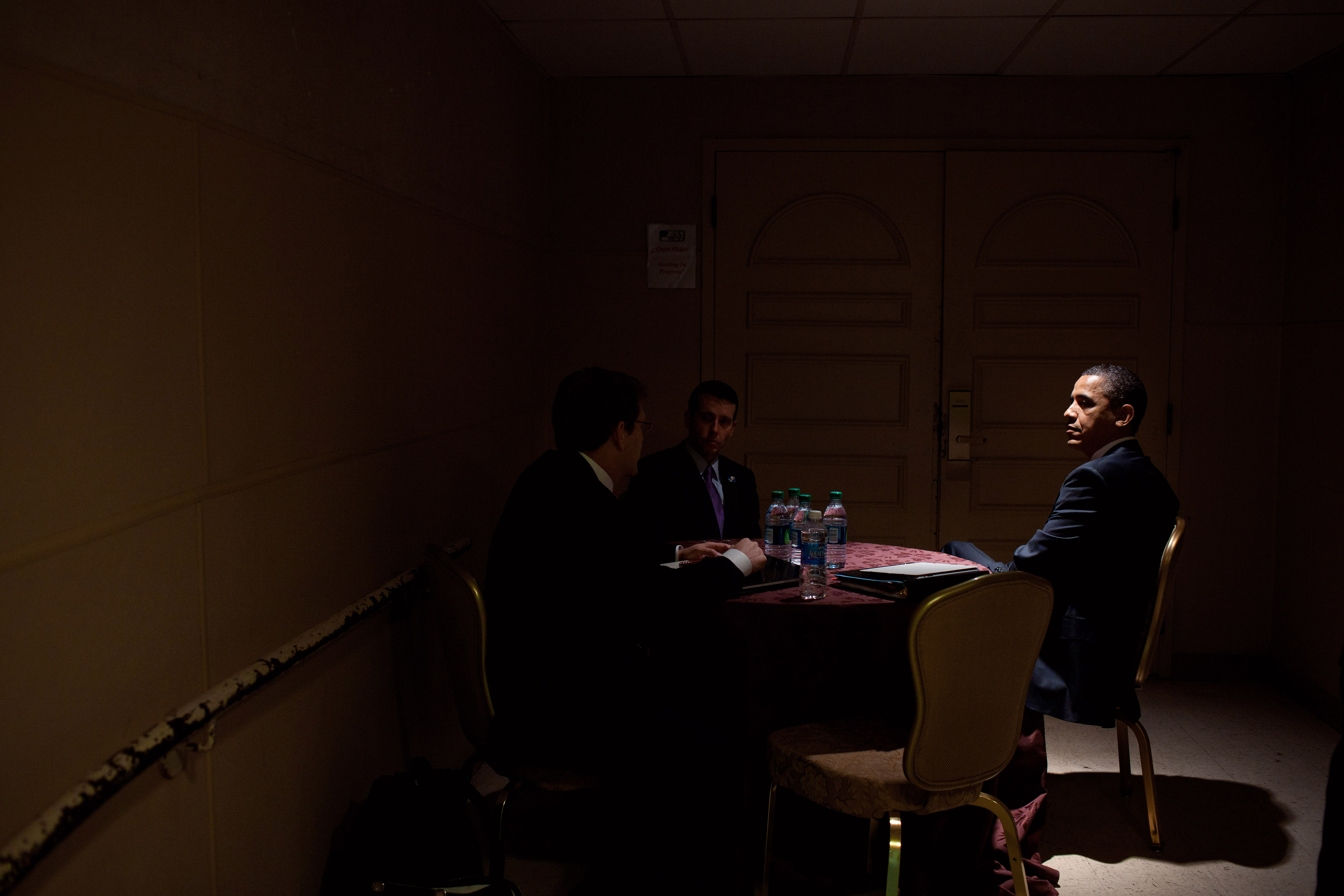 President Barack Obama meets with Press Secretary Jay Carney and Senior Advisor David Plouffe