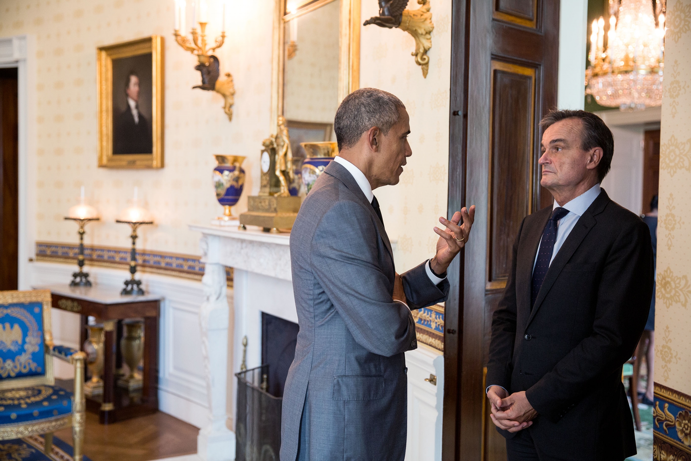 President Barack Obama talks with Ambassador of France to the United States Gérard Araud in the Blue Room of the White House prior to the Diplomatic Corps Reception, July 15, 2016.