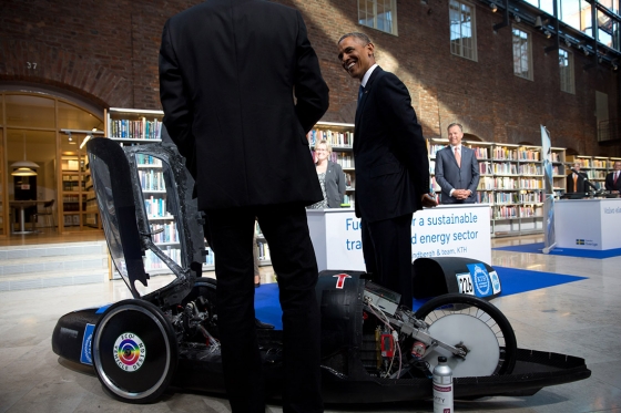 President Barack Obama is shown an example of a vehicle that uses fuel cells during an energy expo at the Royal Institute of Technology in Stockholm, Sweden