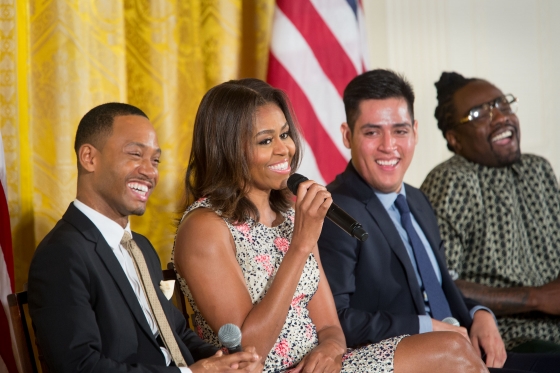 First Lady Michelle Obama participates in a discussion with panelists during the 2015 Beating the Odds Summit
