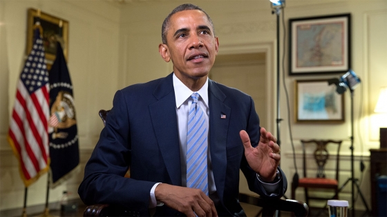 President Barack Obama tapes the Weekly Address in the Map Room of the White House, July 25, 2014.