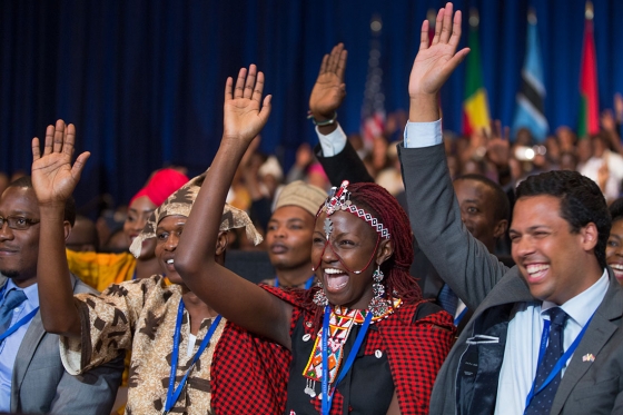 People taking part in the Young African Leaders Initiative town hall raise their hands