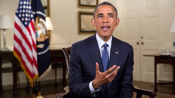 President Barack Obama tapes the Weekly Address in the Map Room of the White House, Aug. 1, 2014.