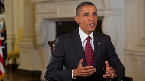 President Barack Obama tapes the Weekly Address in the State Dining Room of the White House Aug. 9, 2013.
