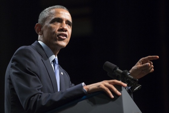 President Barack Obama waves to the audience after delivering remarks at the Cahn Auditorium at Northwestern University