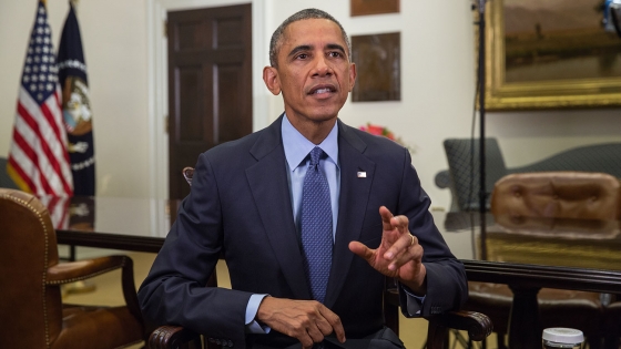 President Barack Obama tapes the Weekly Address in the Roosevelt Room of the White House, Oct. 9, 2014.