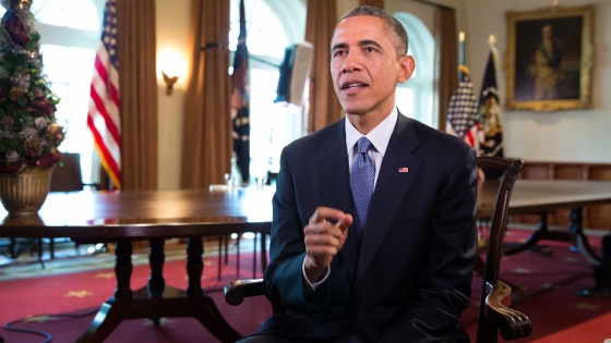 President Barack Obama tapes the Weekly Address in the Cabinet Room of the White House, Dec. 19, 2014