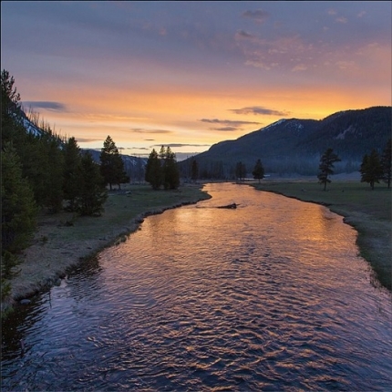 Spring sunset on the Madison River in Yellowstone National Park.