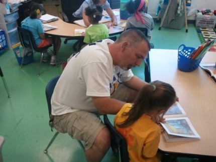 Watch D.OG.S. Dad Volunteers with Reading