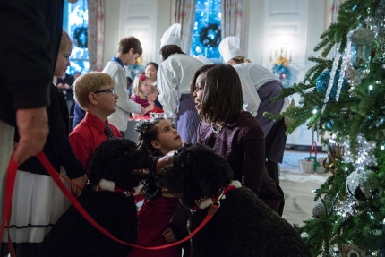 First Lady Michelle Obama and children of military families visit with surprise guests Obama family pets Bo and Sunny