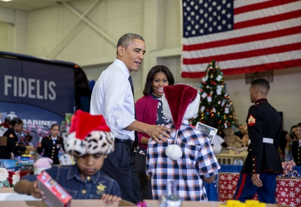 President Obama And The First Lady Sort Toys