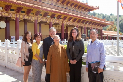USCIS District Director Susan M Curda with Paul Chang at the Hsi Lai Temple