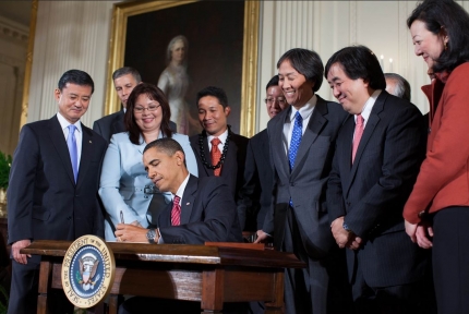 Assistant Secretary for Health Dr. Howard K. Koh Watches as President Barack Obama Signs Executive Order Restoring the White House AAPI Initiative