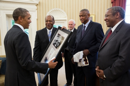 President Barack Obama greets members of the 1963 Loyola University Chicago Ramblers.