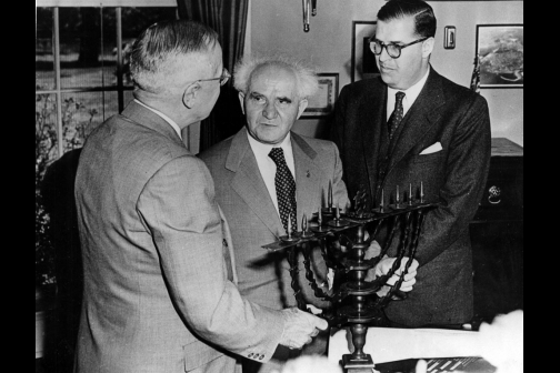 David Ben-Gurion, Israeli Prime Minister, and Abba Eban, Israeli Ambassador to the United States, presented Harry S. Truman with a menorah in the White House on May 8th, 1951. 