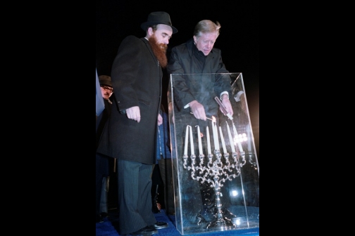 Jimmy Carter lights a menorah at the White House Ellipse, December 7, 1979.