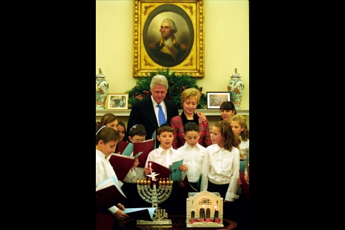 Bill Clinton and Hillary Rodham Clinton at a Hanukkah celebration in the Oval Office, December 21, 2000.  