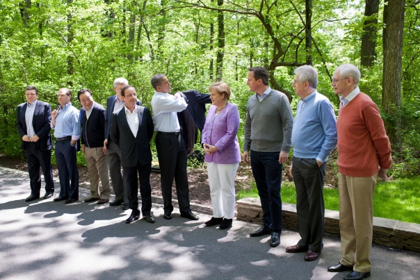 President Obama Puts His Jacket On