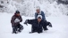 The President playing with his Daughters in the Snow