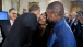 President Obama Gets a Kiss After His Remarks at the White House Summit on Worker Voice
