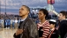 The President and the First Lady watch the retiring of the colors