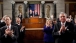 People Applaud As President Barack Obama Enters The House Chamber 