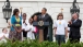 The President delivers remarks to onlookers