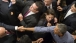 President Obama greets the audience at the Boston Labor Day Breakfast
