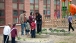 First Lady Michelle Obama Examines Garden Boxes