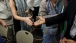 Secretary Shinseki Hands Out a Challenge Coin