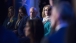 Former Rep. Gabrielle "Gabby" Giffords and her husband Capt. Mark Kelly attend a town hall event with President Barack Obama