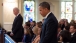 President Obama and Vice President Biden Stand in Church