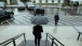 President Obama departs the EEOB under an umbrella