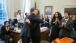 President Obama hugs Jennifer Palmieri during a farewell party