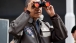 President Barack Obama Uses Binoculars To View The DMZ