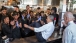 President Obama Slides Across a Counter at Shake Shack
