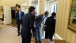 President Obama Looks At Exhibits From The Oval Office