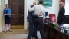 President Obama watches news coverage of the Senate vote