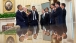 President Obama Talks with Staff in the Oval Office 