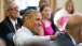 President Obama puts his arm on the Vice President's shoulder