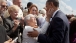 President Barack Obama Is Greeted By Guests